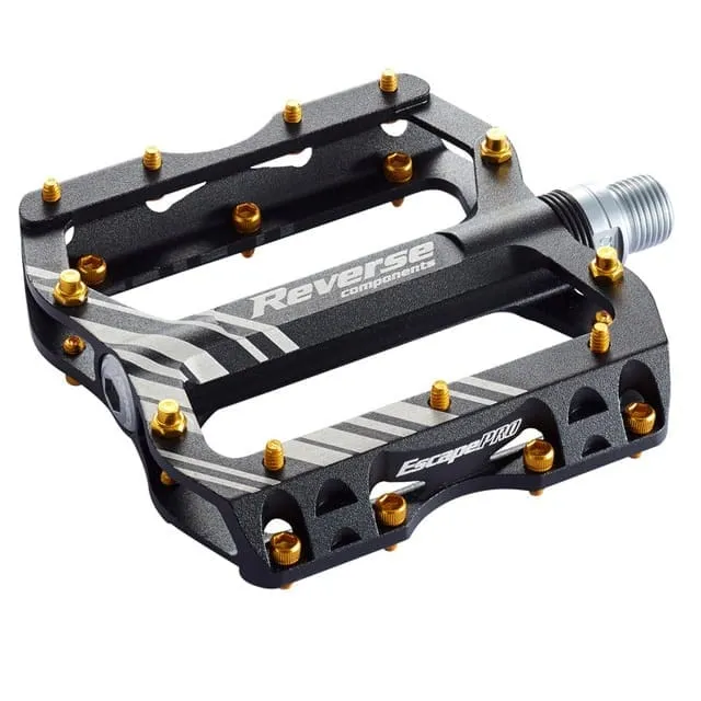 Płaskie pedały REVERSE COMPONENTS ESCAPE PRO czarny/złoty